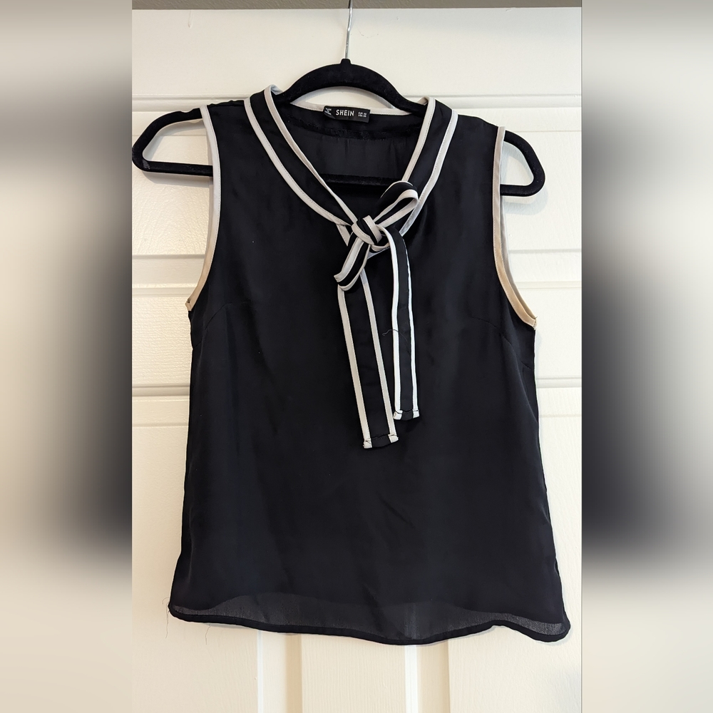 Black tie neck sleeveless blouse